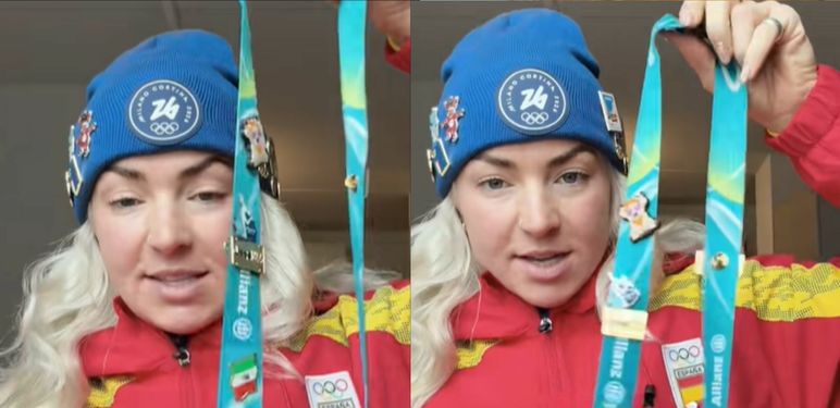 Španjolska klizačica koja pokazuje značke s Olimpijskih igara