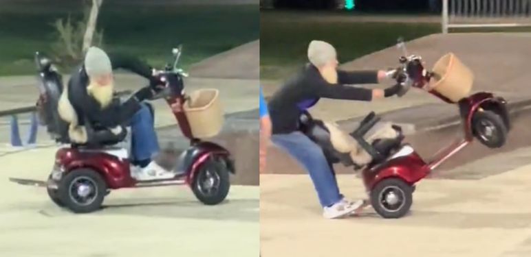 Čovjek s dugom sjedom bradom kako vozi skuter u skateparku