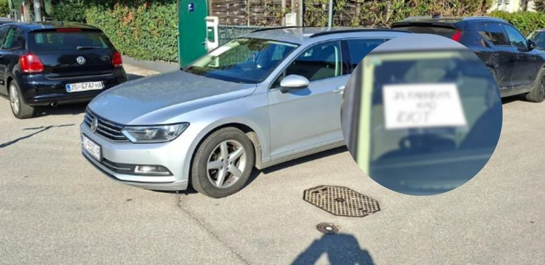 Nepropisno parkirano vozilo i natpis na staklu