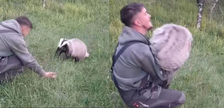 Mladić u susretu sa svojim ljubimcem jazavcem