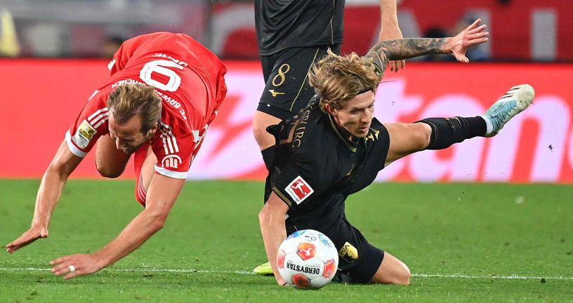 Kristijan Jakić i Harry Kane u duelu