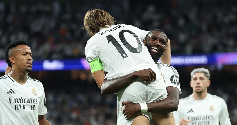 Luka Modrić u rukama Rudigera