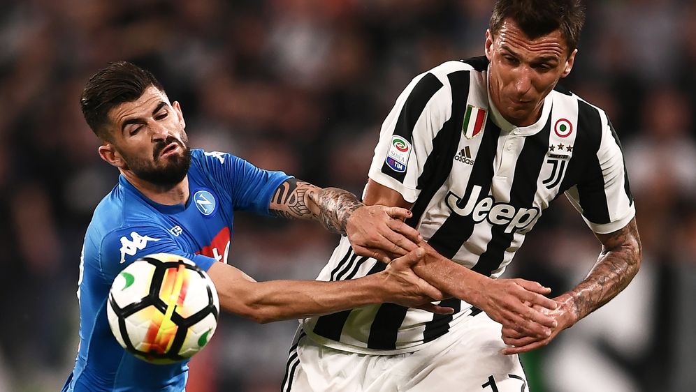 Mandžukić u borbi za loptu (Foto: AFP)