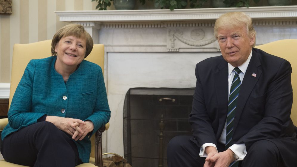 Angela Merkel i Donald Trump (Foto: AFP)