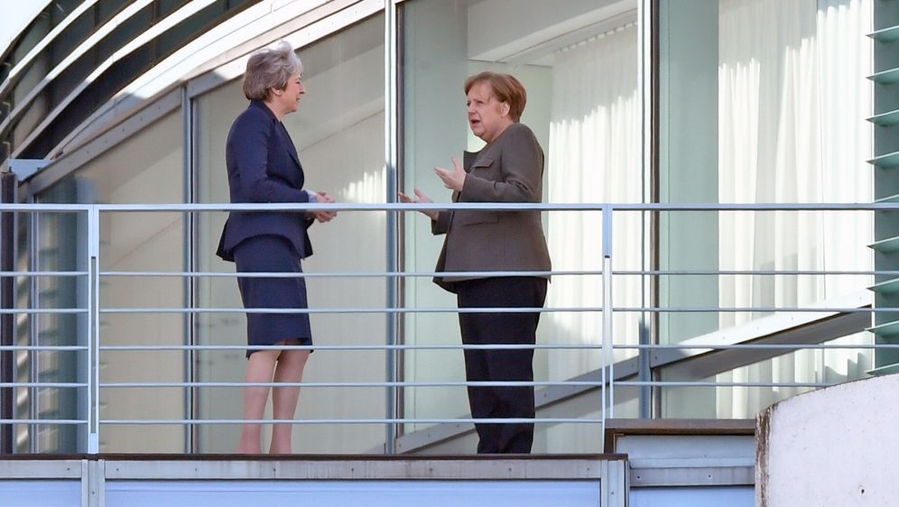 Theresa May i Angela Merkel (Foto: AFP)
