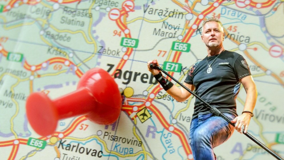 Karta Zagreba s pribadačom i pjevač Marko Perković Thompson