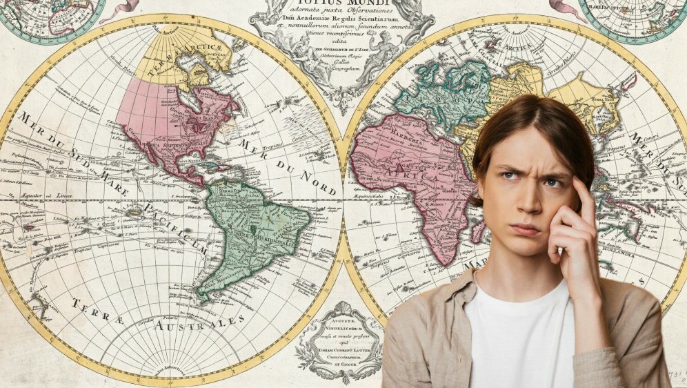 Muškarac koji razmišlja i stara karta svijeta