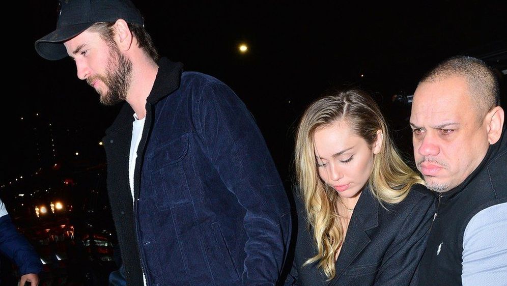 Miley Cyrus i Liam Hemsworth (Foto: Profimedia)