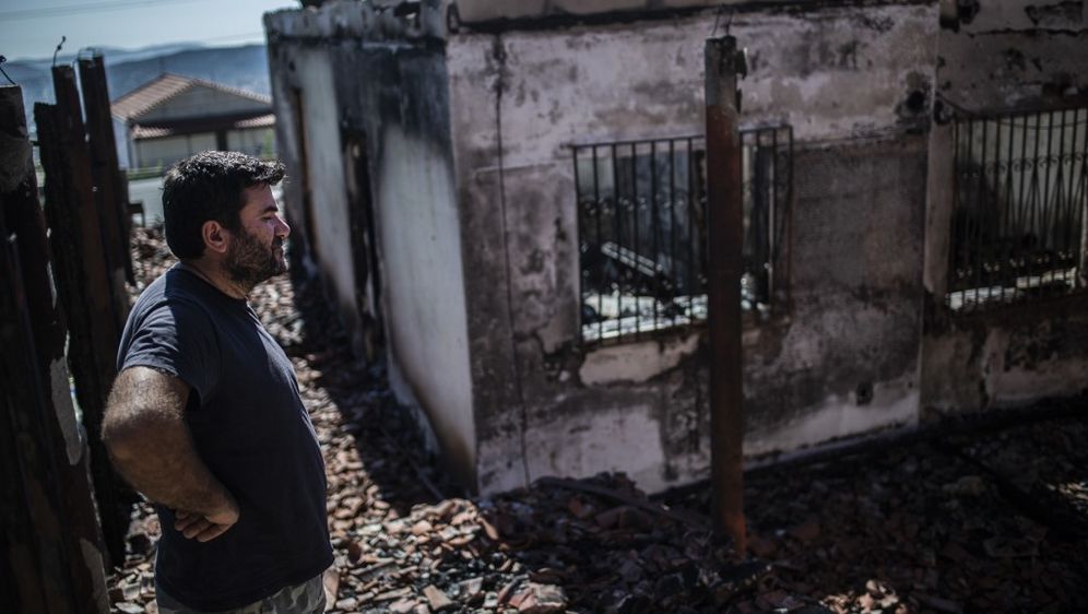 Posljedice požara blizu Atene (Foto: AFP)