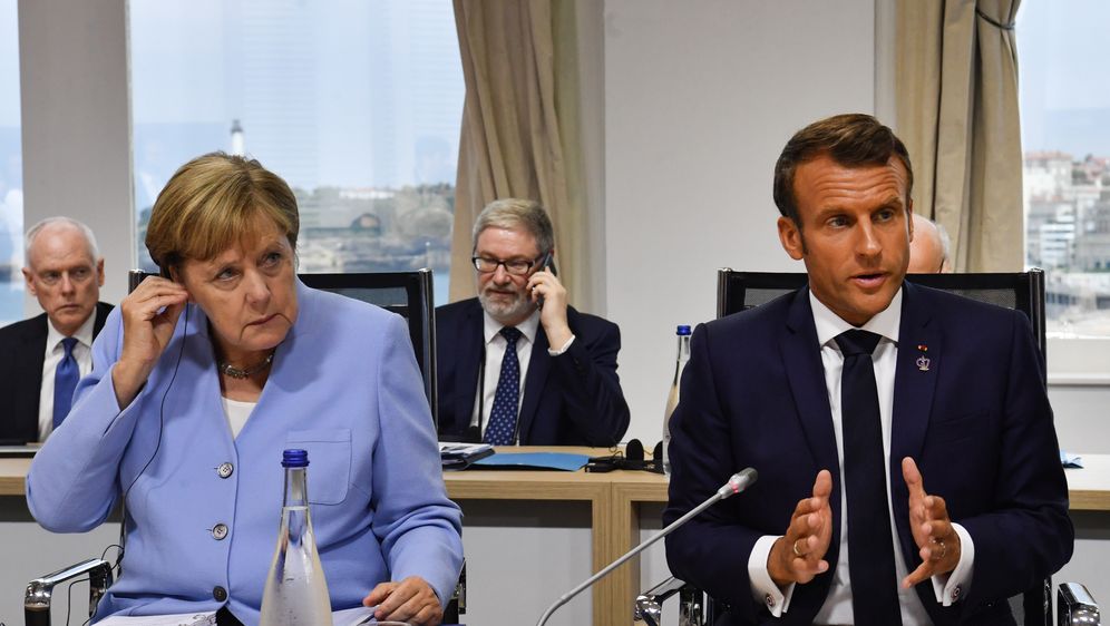 Angela Merkel i Emmanuel Macron (Foto: AFP)