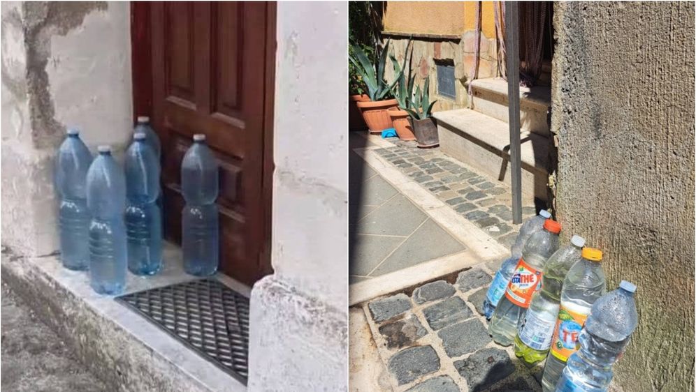 Boce s vodom ispred kuće