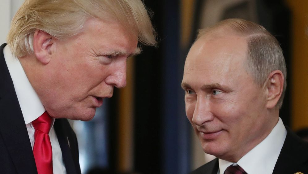 Donald Trump i Vladimir Putin na APEC-u (Foto: AFP)