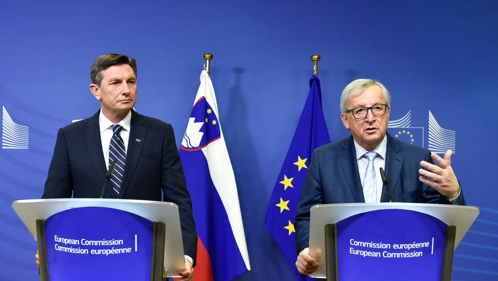 Borut Pahor i Jean-Claude Juncker (Foto: AFP)