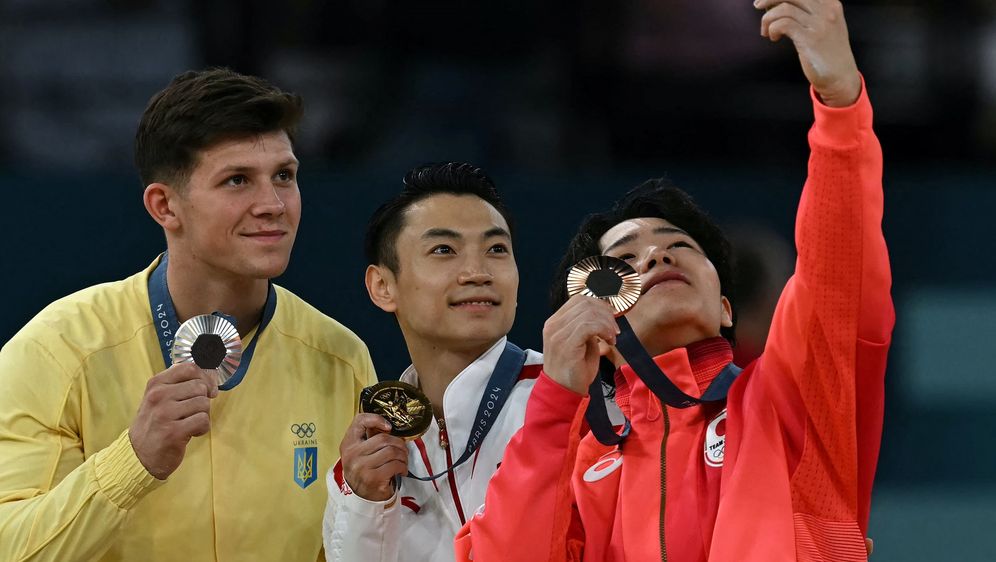 llia Kovtun, Zou Jingyuan i Shinnosuke Oka