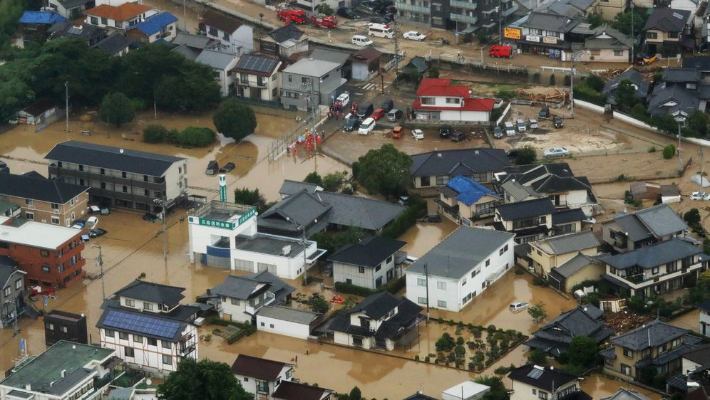 Poplave uzrokovane obilnim kišama u Japanu (Foto: AFP)