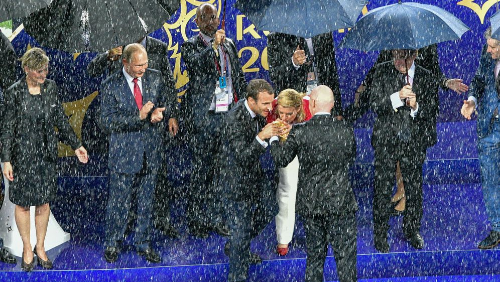 Vladimir Putin, Emmanuel Macron i Kolinda Grabar-Kitarović (Foto: AFP)