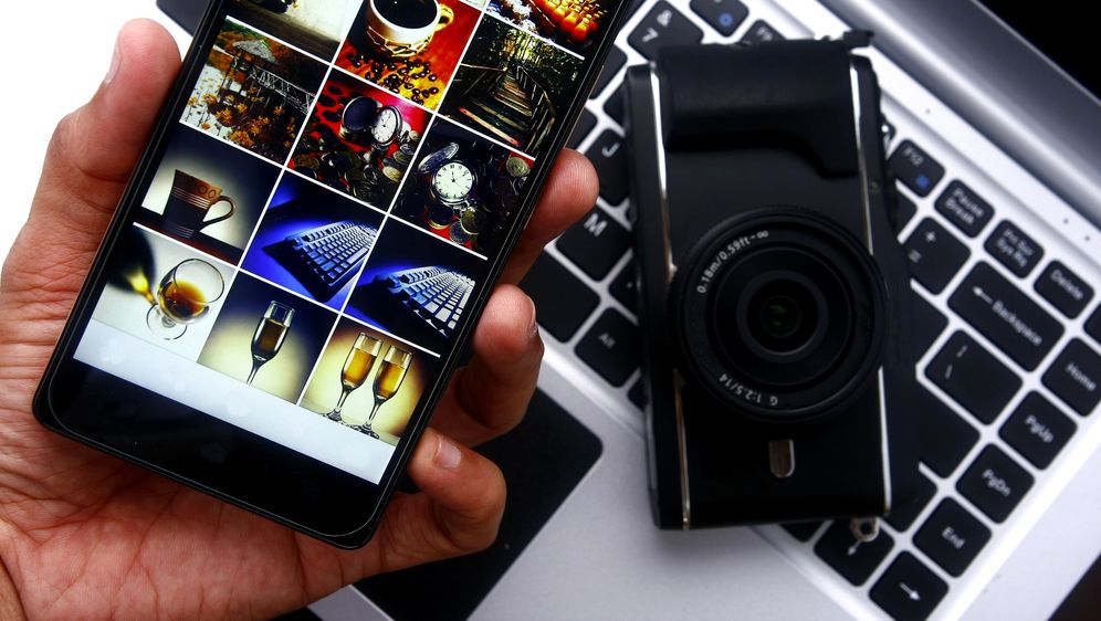 Pametni telefon i fotoaparat (Foto: Getty Images)