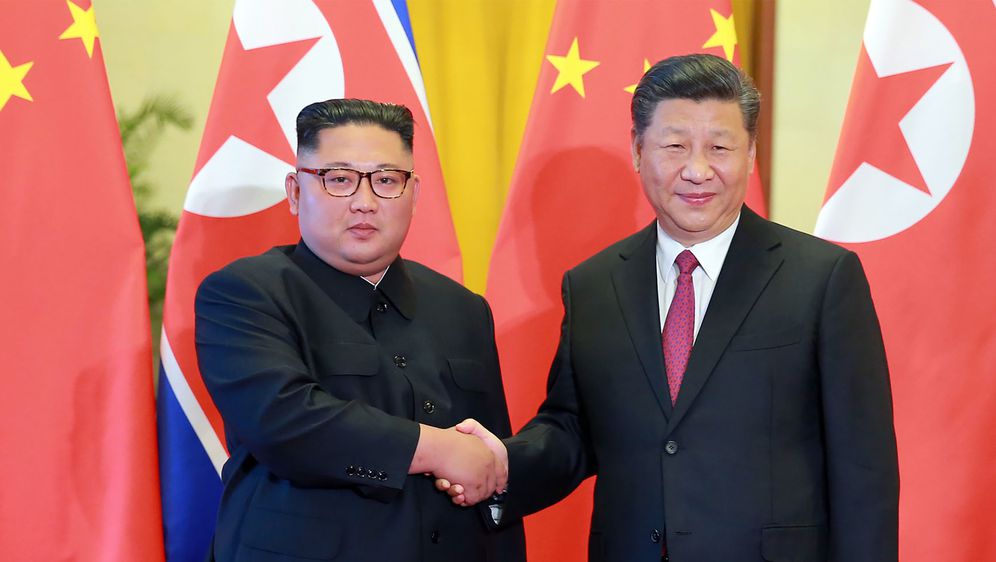 Kim Jong-un i Xi Jinping (Foto: AFP)