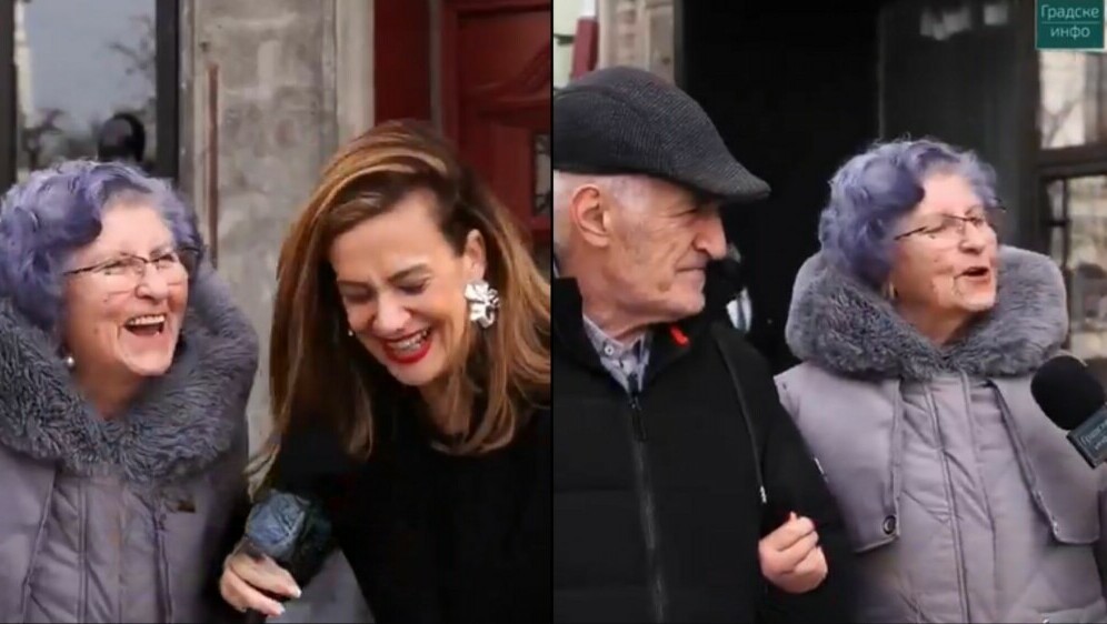 Stariji par kako odgovora na pitanja pri intervjuu na ulici