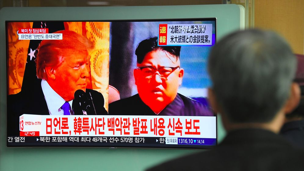 Donald Trump i Kim Jong Un (Foto: AFP)