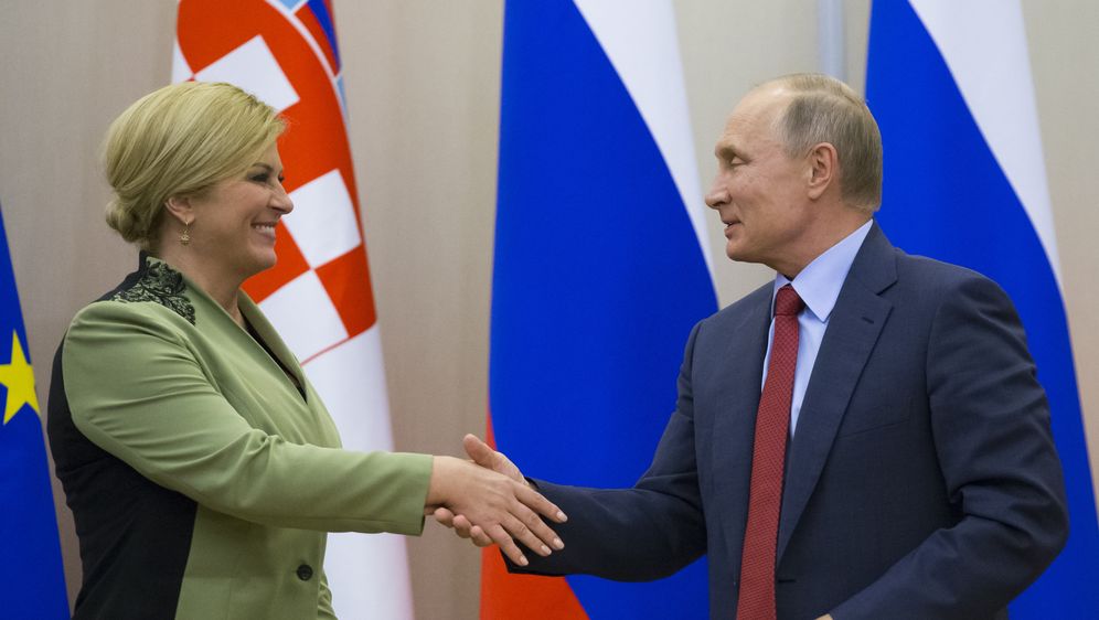 Kolinda Grabar-Kitarović i Vladimir Putin (Foto: AFP)