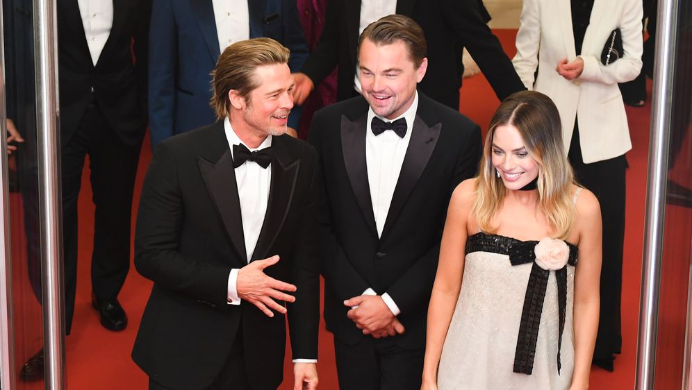 Brad Pitt, Leonardo DiCaprio i Margot Robbie (Foto: AFP)