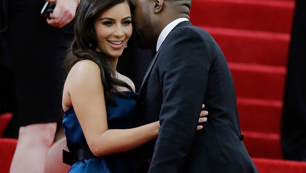 Kim Kardashian i Kanye West (Foto: AFP)