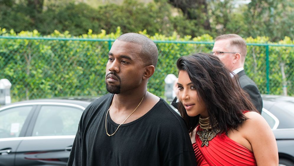 Kim Kardashian i Kanye West (Foto: AFP)