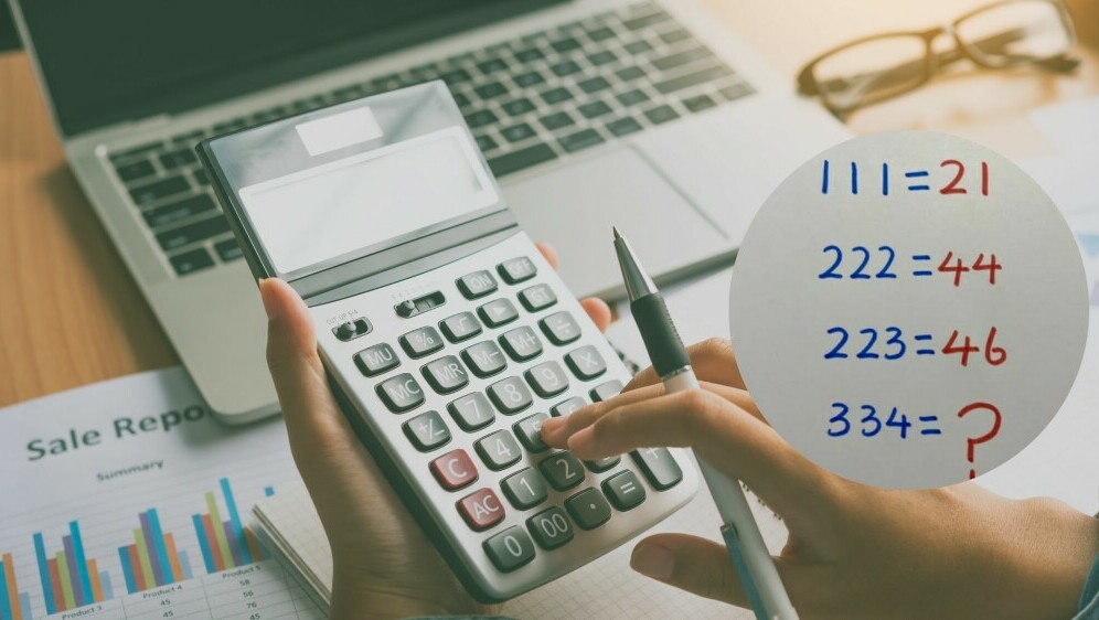 Osoba koja računa na kalkulator i matematička zagonetka