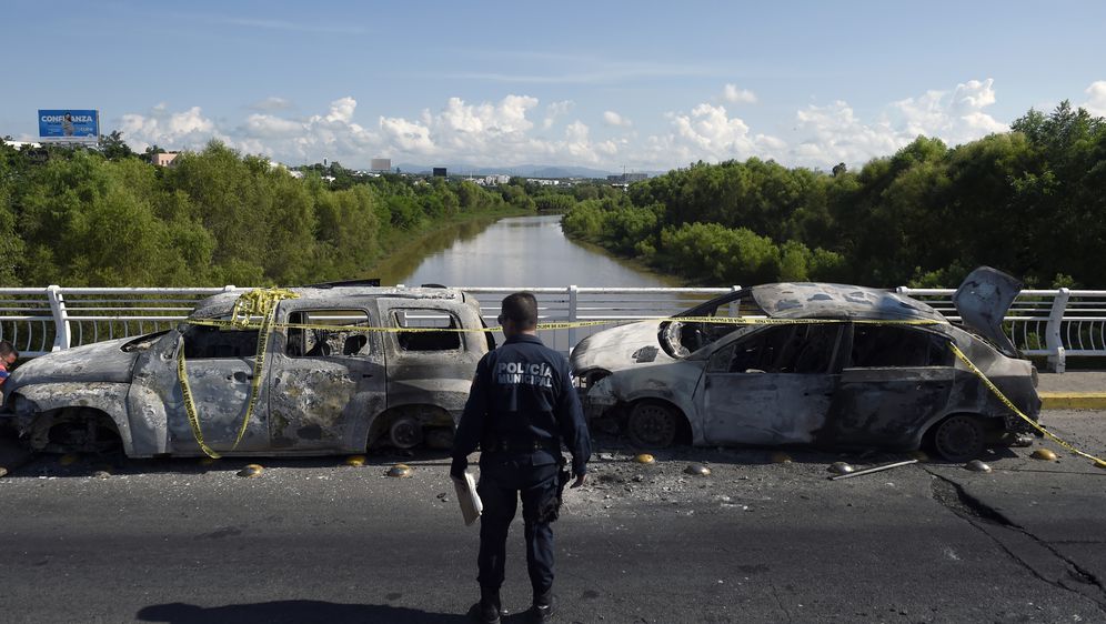 Automobili ubijene obitelje nakon napada narkokartela (Foto: AFP)