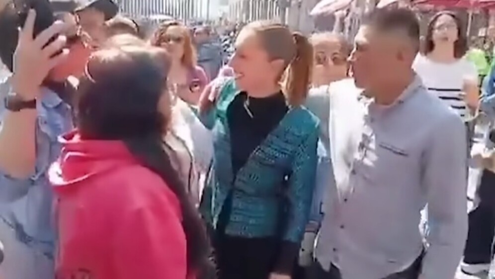 Nepoznati muškarac s predsjednicom