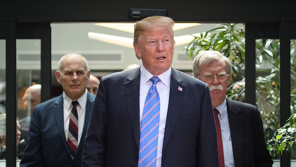 John Kelly, Donald Trump i John Bolton (Foto: LEON NEAL / GETTY IMAGES NORTH AMERICA / AFP)