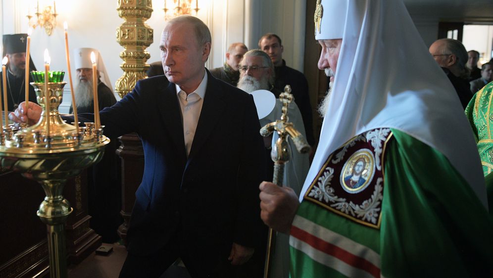 Patrijarh Kiril s ruskim predsjednikom Putinom (Foto: AFP)