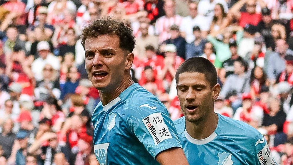 Fisnik Asllani i Andrej Kramarić