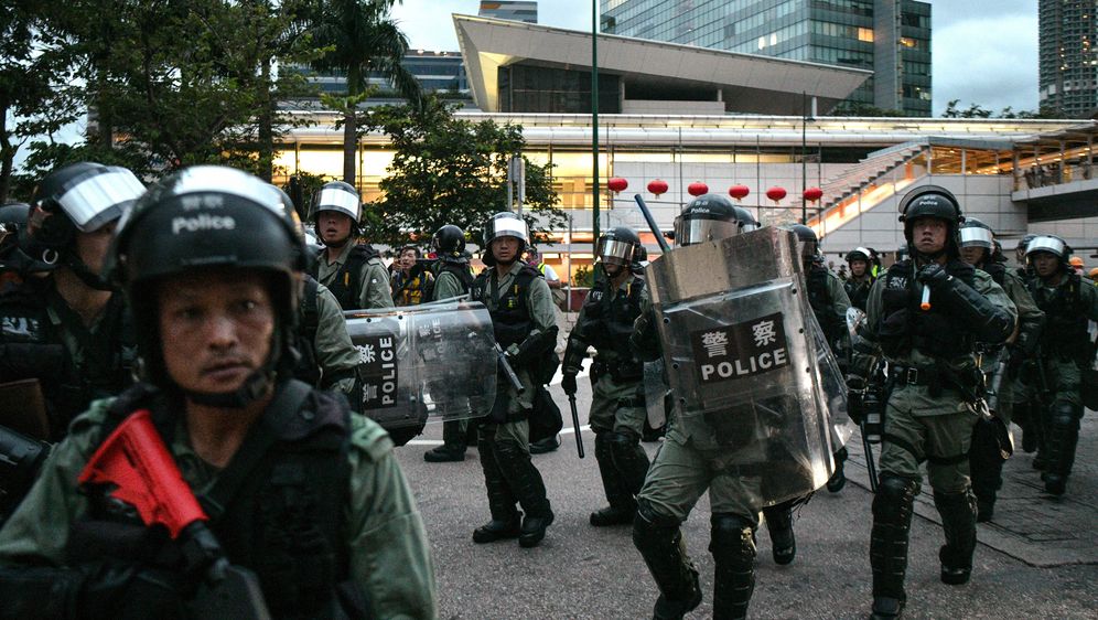 Policija, Kina, Ilustracija (Foto: Anthony WALLACE / AFP)